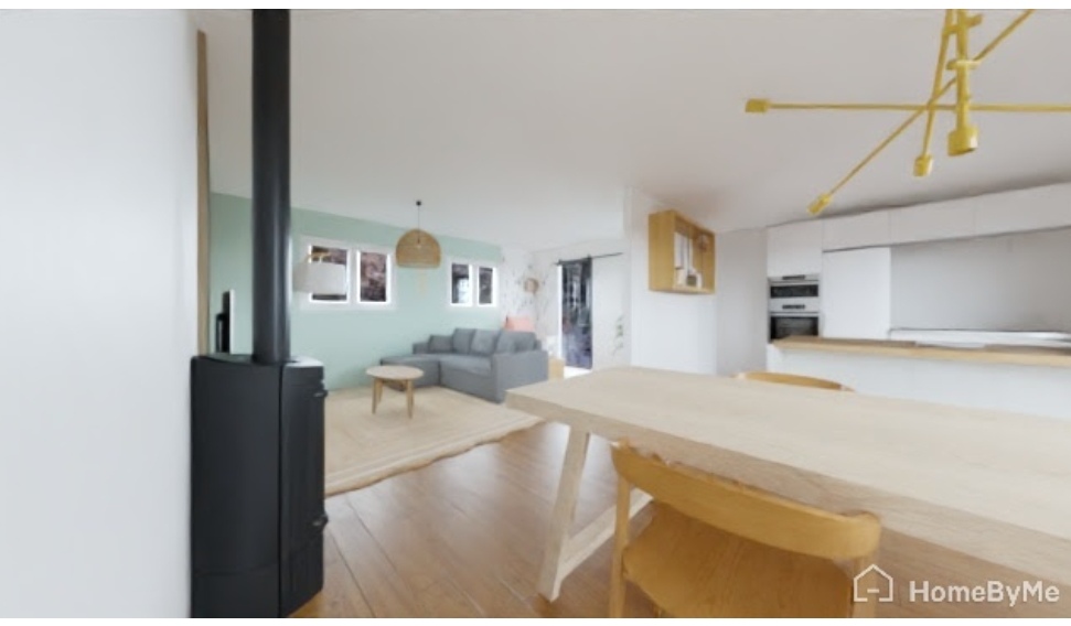 Pièce de vie avec cuisine ouverte par l'agence Terre d'Habitats